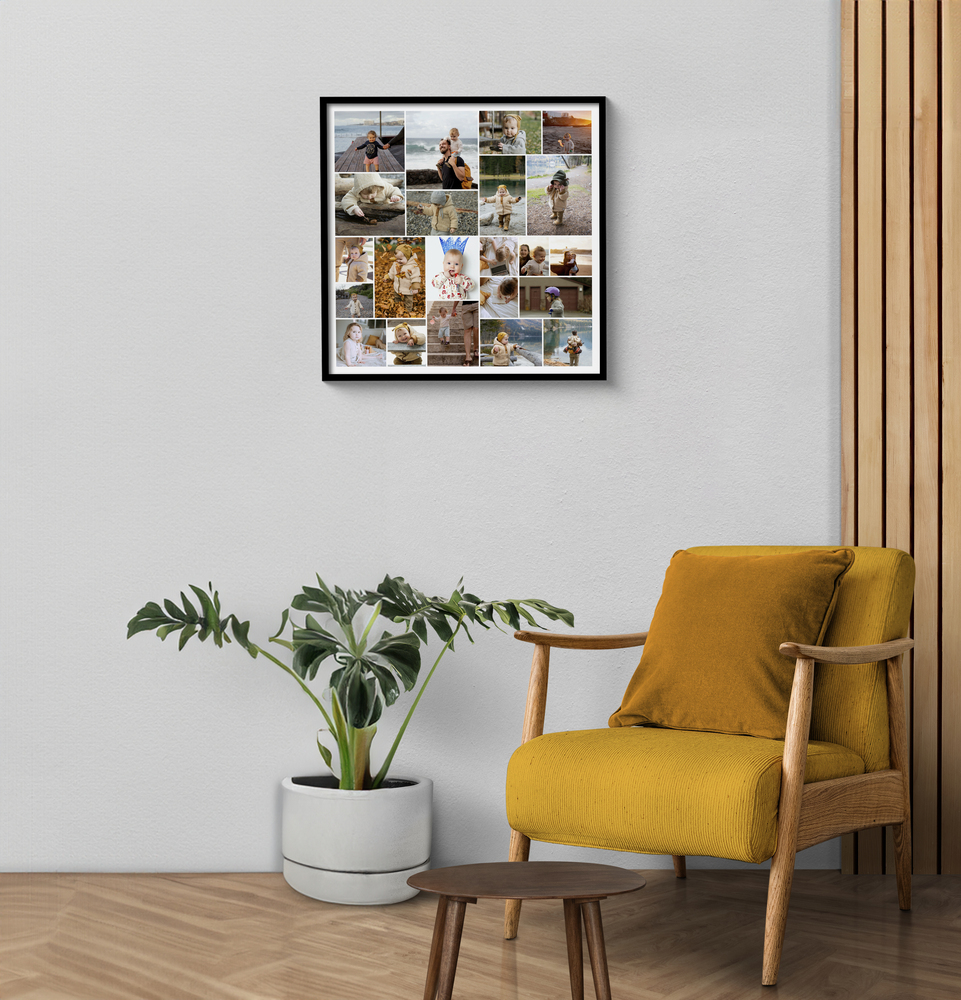 Black-framed family photo collage on a light living room wall beside a mustard-yellow armchair