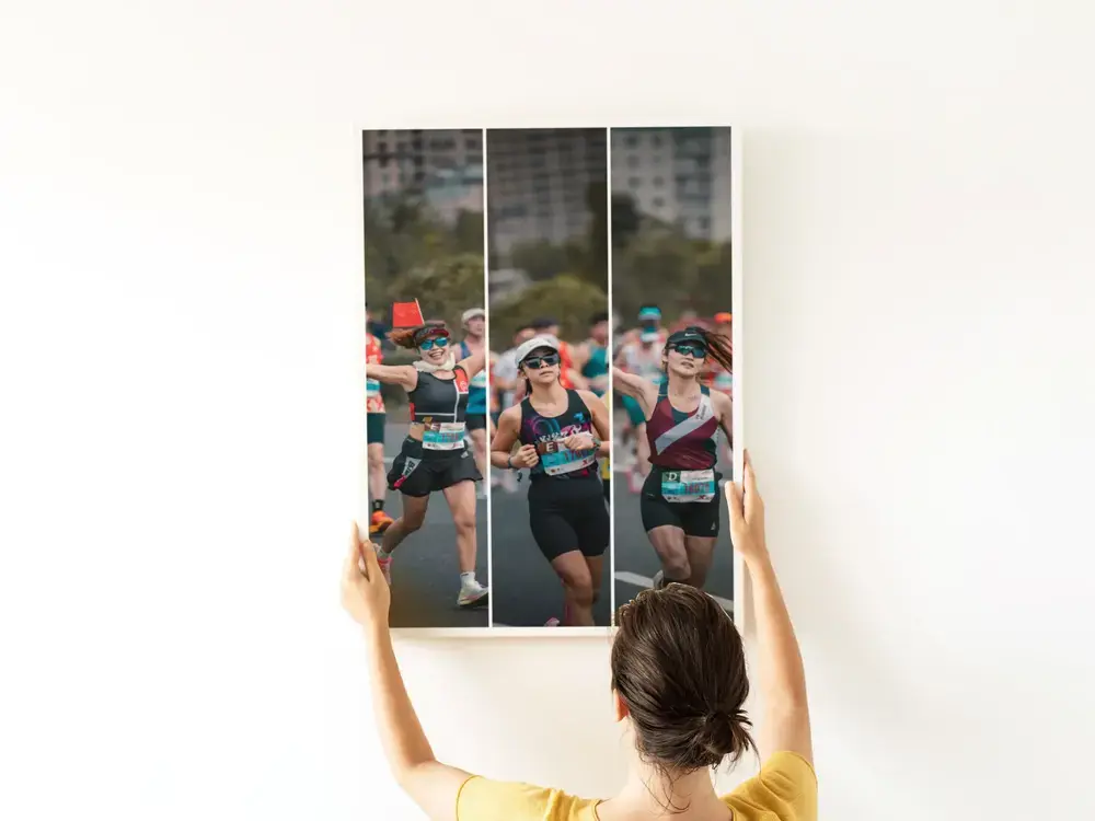 Marathon photo collage with three women runners in vertical panels on a light wall, a gift for a running friend