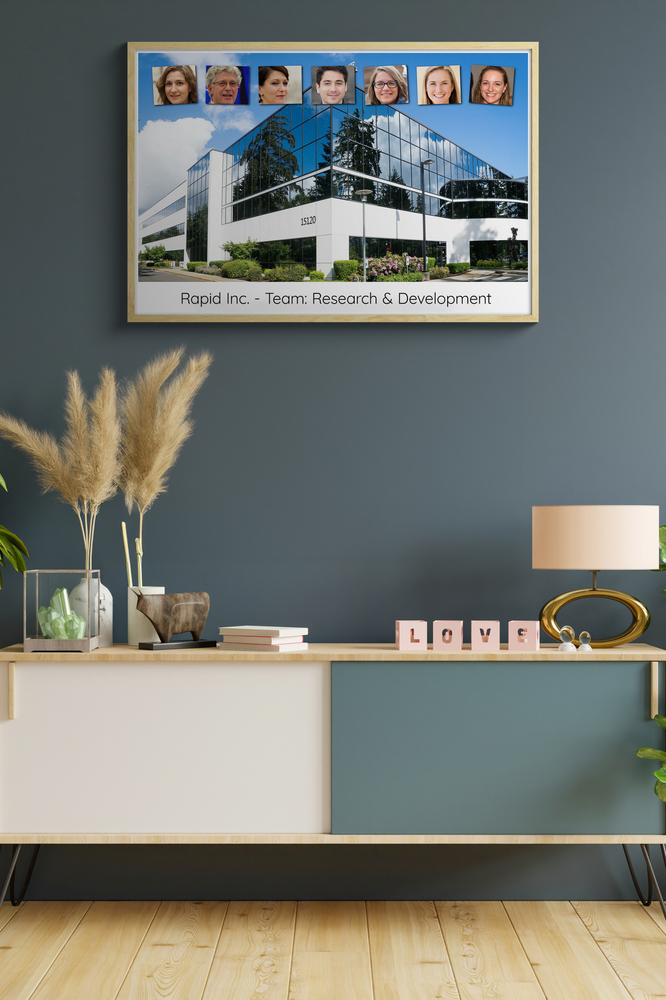 Team photo collage with seven employee portraits above an office building, in a wood frame over a sideboard