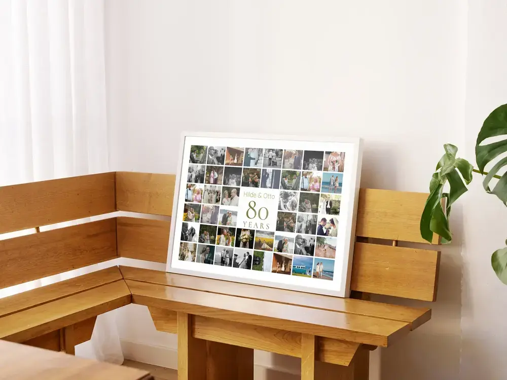 Personalized photo collage with a central 80 and a grid of couple photos, in a white frame on a wooden corner bench