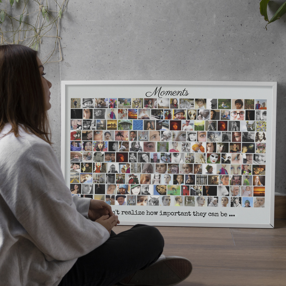 White-framed photo collage with many photos in rows and a quote, resting on a wood floor against a concrete wall